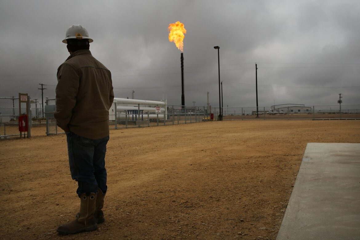 Flared natural gas is burned off at Apache Corporations operations at the Deadwood natural gas plant in the Permian Basin.